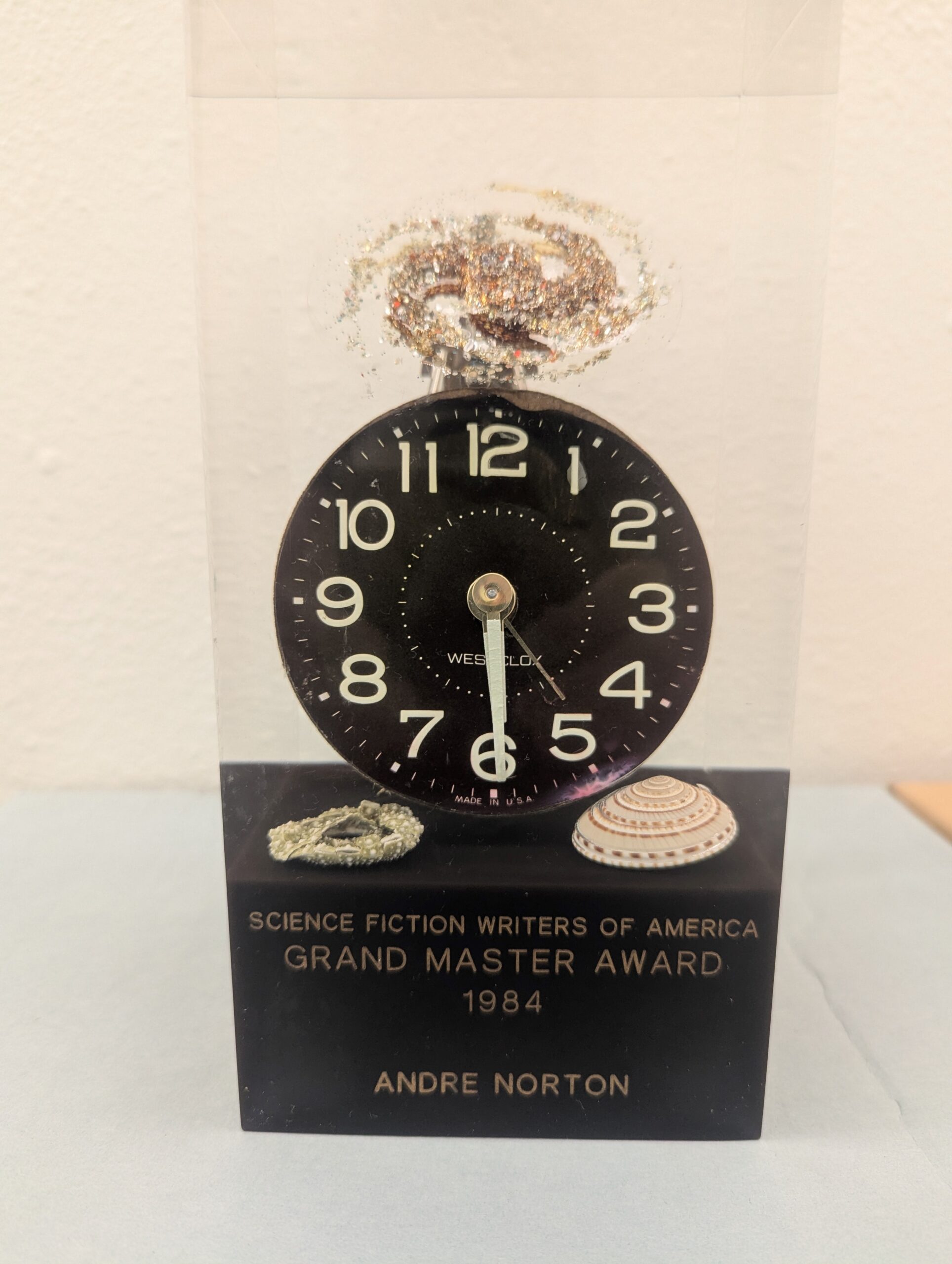 Andre Norton’s 1984 Grand Master Award. Note the use of the clock face and seashells. (Photo by Jeremy Brett, Courtesy of Texas A&M University, Cushing Memorial Library and Archives, Science Fiction and Fantasy Research Collection)